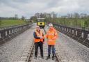 Dr Graham Plant, the GWSR’s civil engineering director (right), formally returns control of Stanway Viaduct to Neil Carr, operations manager