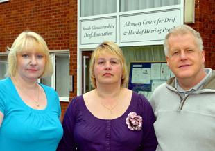 Alyson Jellings, Barbara Martin and Mark Shepherd of the South Gloucestershire Deaf Association outside their office at Frome House