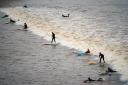 Surfers ride the first a 'five-star' Severn Bore of 2024 at Newnham