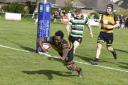 Gez Asante diving over to score Thornbury's fourth try of the cup triumph over Tottonians