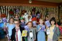 Minchinhampton School pupils with their book A Portal Through Time