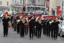 The Band of the Light Cavalry march up the High Street 
