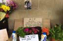 Flowers have been left for Russell Jackson at Tesco Metro in Cirencester.