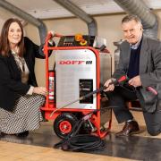 Angela Southern and Brian Crowe with the new Doff III machine