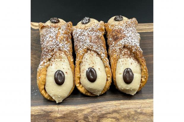 Grab an indulgent cannoli at the market every Saturday this month. Library image