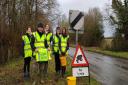 Coaley Toad Patrol volunteers at the crossing near Coaley Mill