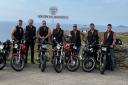 The bikers at the finish line at Land's End after riding 1,093 miles in five days