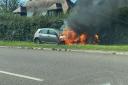 A vehicle was engulfed by flames along the A38 at Alveston on Sunday afternoon - picture by Izzy Oakey
