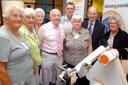 Sir David McMurtry, chairman and chief executive of Renishaw, with the Friends of Frenchay Hospital during their visit to Renishaw