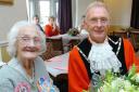 Mayor of Yate Cllr Ian Blair presented flowers to Irene Dutfield at her 100th birthday party