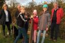Members of the Olveston Parish Council biodiversity group and school children