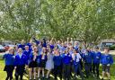 Pupils from Blue Coat Primary celebrating their school's recent Ofsted result