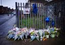 Flowers and tributes near to the scene in south Bristol - photo by Ben Birchall/PA Wire