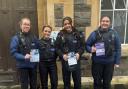 Officers from Avon and Somerset Police with leaflets promoting the Walk and Talk scheme