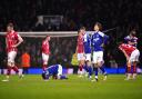 Ipswich Town's Conor Chaplin (second left) celebrates victory after the final whistle as Bristol City players look dejected