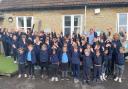 Pupils and staff from Hillesley Primary celebrating the school's recent good Ofsted report