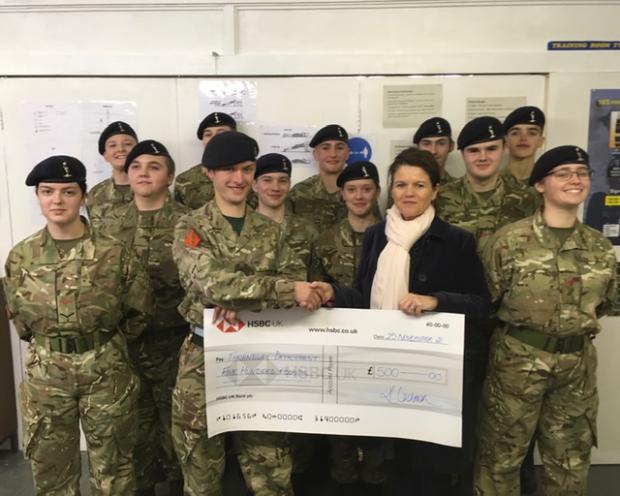 Gazette Series: Mrs Katy Cadman with S/Sgt Liam Read, presenting the cheque to the Detachment