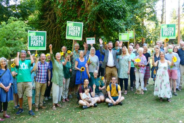 Pete Kennedy with district and town councillors and Green party supporters at Stratford park