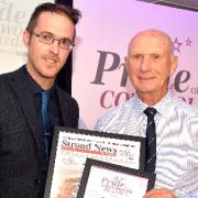 Newsquest sales director Carl Badham presents Brian Stevens with his award
