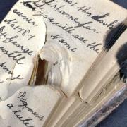 A notebook which saved a soldier's life when a bullet struck it in his pocket is to be auctioned. Photo: SWNS