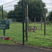 The school playground, behind the new security fence, where the existing footpath runs