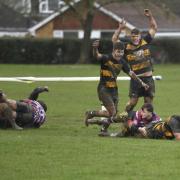 Sam Butcher scores Thornbury’s second try, to the delight of of Jake Wood (left) and Jay Burley