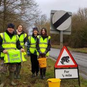 Coaley Toad Patrol volunteers at the crossing near Coaley Mill