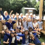 Pupils at Raysfield Primary enjoying their outside learning area