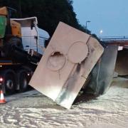 The overturned lorry along the M32