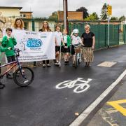 Pupils from The Ridge Juniors in Yate plus Councillor Louise Harris, Emily Harrison from the school leadership team, active travel champion Beverley Furber