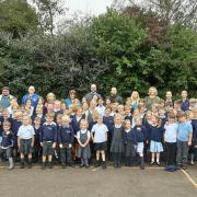 Pupils and staff from Hawkesbury Primary School celebrating their recent good Ofsted rating