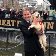 Dan Norris celebrating with his dog Angel after being elected West of England mayor in 2021