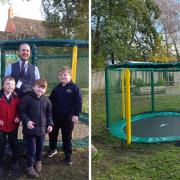 Headteacher Karl Hemmings with pupils by the new trampoline