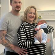 Parents Sean Timbrell and Alexa Timbrell with their fourth child Renley