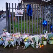 Flowers and tributes near to the scene in south Bristol - photo by Ben Birchall/PA Wire