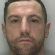 Scott McGuinness, of Lattistep Court, Gloucester, tried escaping police naked when officers raided his home in search of sawn off shotgun