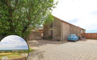 See inside this converted barn property with stunning views for sale on Zoopla (Zoopla/Canva)