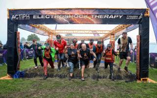 Competitors taking part in the Tough Mudder on Saturday