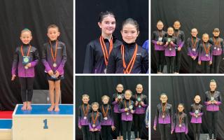 Gymnasts from Kestrel Acrobatics and Tumbling celebrating  their recent success